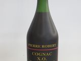 a bottle of wine that is sitting on a table
