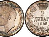 a close up of a coin with a crown on it