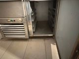 an image of a kitchen with a refrigerator in it