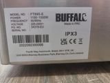 a label on the back of a refrigerator that is on a table