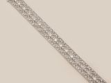 un bracelet en diamants et en or blanc