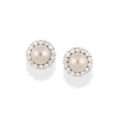 a pair of cultured pearl and diamond earrings