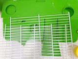 a green tray that has some food in it
