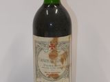 a bottle of wine that is sitting on a table