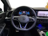 the interior of a car with a steering wheel and dashboard lights