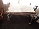 a table that is sitting in the corner of a room
