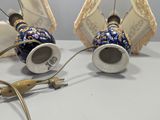 two lamps that are sitting on a table