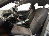 the interior of a car with black seats and a steering wheel