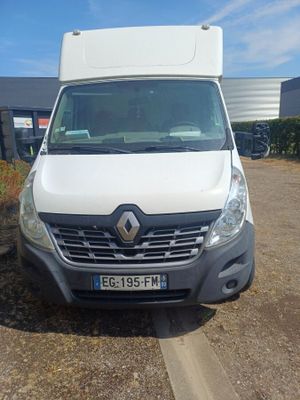 the white van is parked on the side of the road