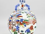 an image of a vase with a painting on it sitting on a table