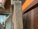 a piece of wood sticking out of a piece of wood