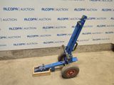 an image of a blue hand truck with a red wheel