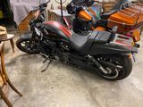 a motorcycle that is parked in a garage