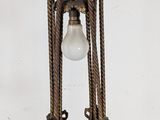 an image of a lamp that is on a stand on a table