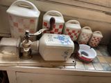 a kitchen counter with a blender and other kitchen items on it