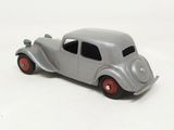 a toy car that is sitting on a white surface