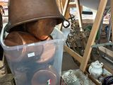 a lot of pots and pans sitting on a table