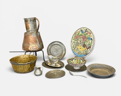 many different types of silverware on a white surface