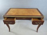 an image of a wooden desk with two drawers and a drawer underneath it
