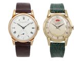 an image of a couple of wrist watches sitting next to each other