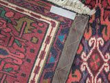 two rugs that are laying on the floor