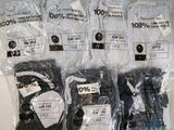 Plusieurs paires de chaussettes pour homme sont emballées dans des sacs en plastique