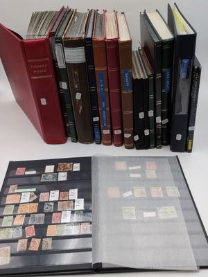 several books are stacked on top of each other on a table
