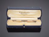 an image of a pen in a box on a table