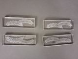 four clear glass trays with etched leaves and leaves on them
