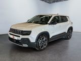 a white suv is parked in a large room