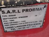 a sign on the back of a red vehicle