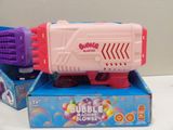 a pink and purple bubble blow gun in a box