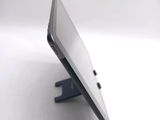 a close up of a cell phone on a stand