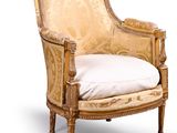 an image of a chair with a cushion on it