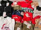 a lot of clothes that are on display in a box