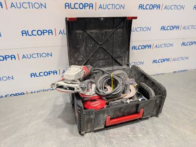 an open tool box with tools in it sitting on a floor
