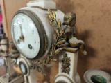 a clock that is sitting on top of a table