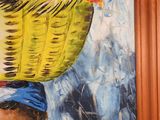 a painting of a woman carrying a basket on her head