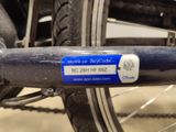 a close up of a bicycle tire with a sticker on it