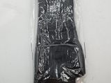 a plastic bag that has some kind of black object in it