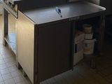 an image of a kitchen with a stove and a sink