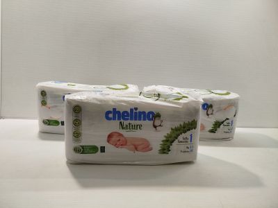 three rolls of toilet paper sitting on top of a counter