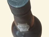 a bottle of wine that is sitting on a table