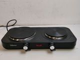 a close up of two burners on top of a counter