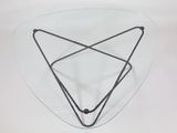 an image of a glass table with a triangle on it