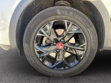 a close up view of a tire on a car