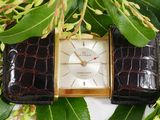 an image of a close up of a wrist watch on a table