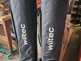 pair of skis sitting on top of a wooden table in a garage