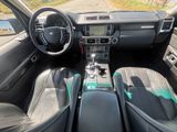 the interior of a car with a steering wheel, dashboard, and dashboard controls