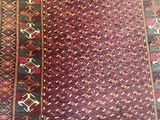 an oriental rug with a red and blue design on it